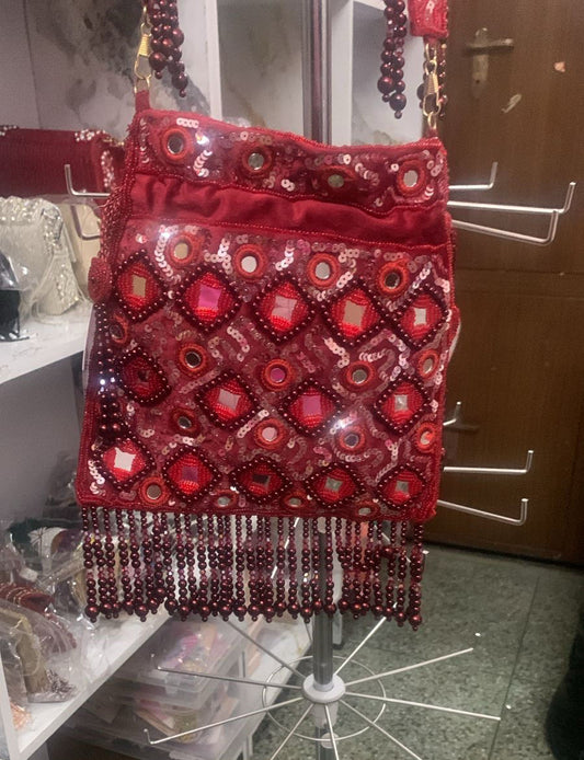 The Ruby Red Mirror potli